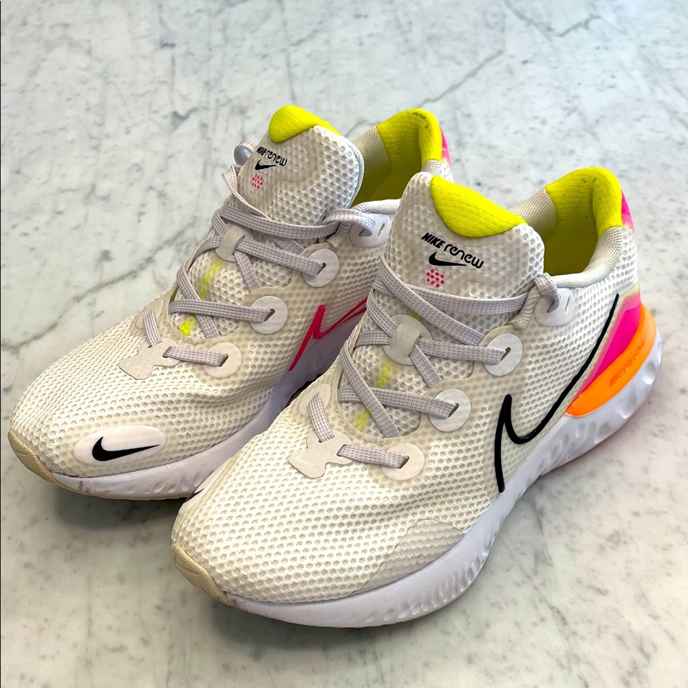 Nike Women’s  White Sneakers with Pink and Yellow Accents